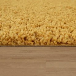 Paco Home Tapis Shaggy Longues Mèches En Différentes Tailles Et Coloris -Magasin Joss & Main shaggy teppich hochflor teppiche langflor wohnzimmer uni einfarbig pflegeleicht gelb gemuetlich edel weich schlafzimmer qualitaet 2 1