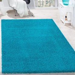 Paco Home Tapis Shaggy Longues Mèches En Différentes Tailles Et Coloris -Magasin Joss & Main shaggy teppich hochflor uni einfarbig kuschelig wohnzimmer teppich flauschig weich oekotex geprueft neu tuerkis turqouise 1